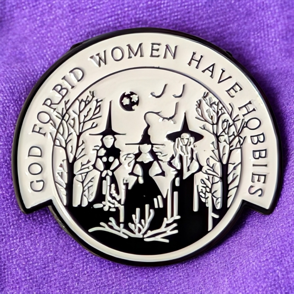 "God Forbid Women Have Hobbies" Black and White Enamel Pin